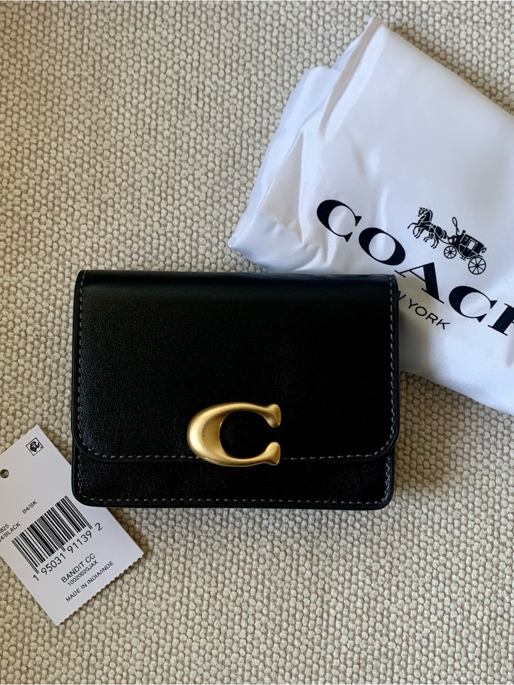 Coach Black Leather Compact Card Holder with Gold 'C' Accent